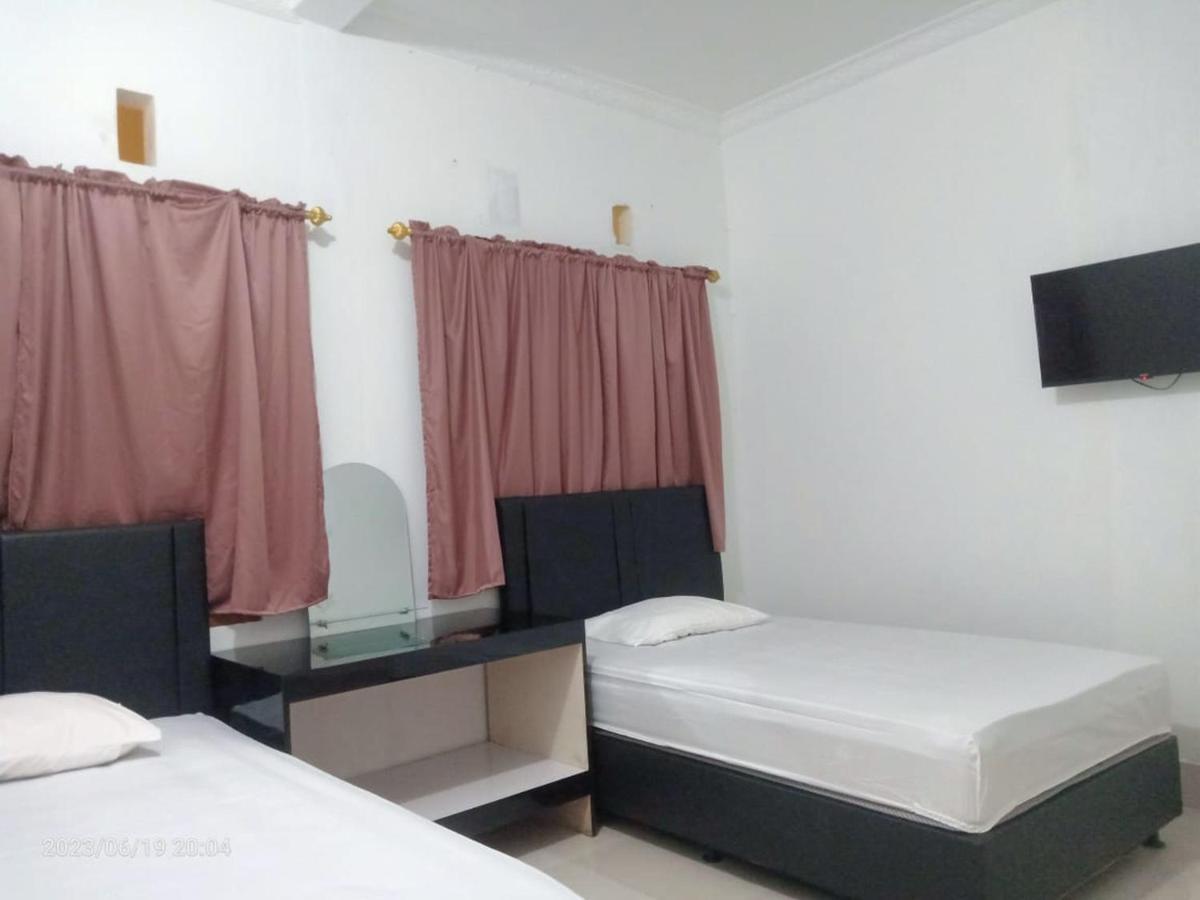 Permata Homestay Kotamobagu Mitra Reddoorz Exterior foto